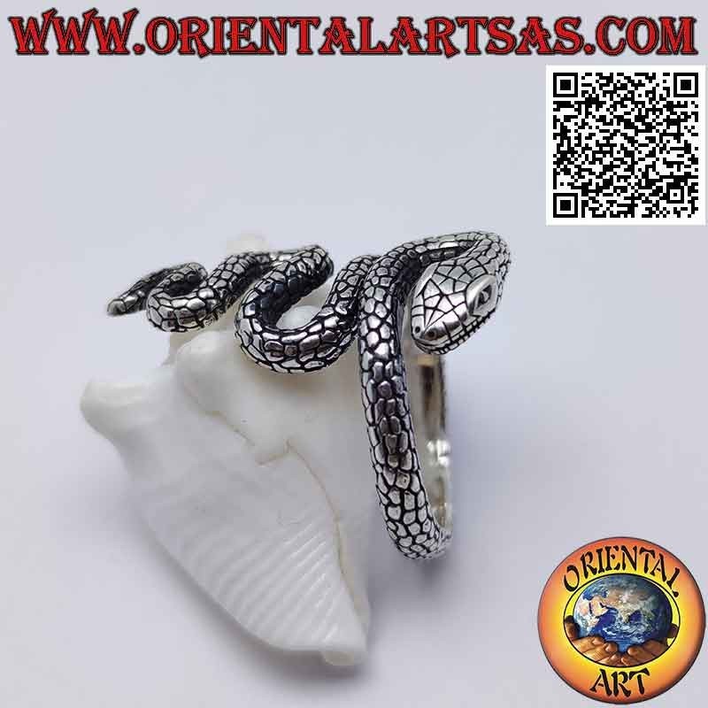 Silver ring in the shape of a desert snake in sinuous movement