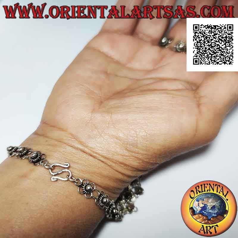 They kiss in 925 ‰ silver small flowers linked together and adjustable ring of flowers