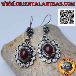 Hook silver earrings with cabochon oval carnelian surrounded by bas-relief circles