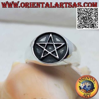 Silver ring with bas-relief pentacle on a darkened round background