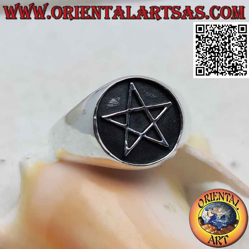 Silver ring with bas-relief pentacle on a darkened round background