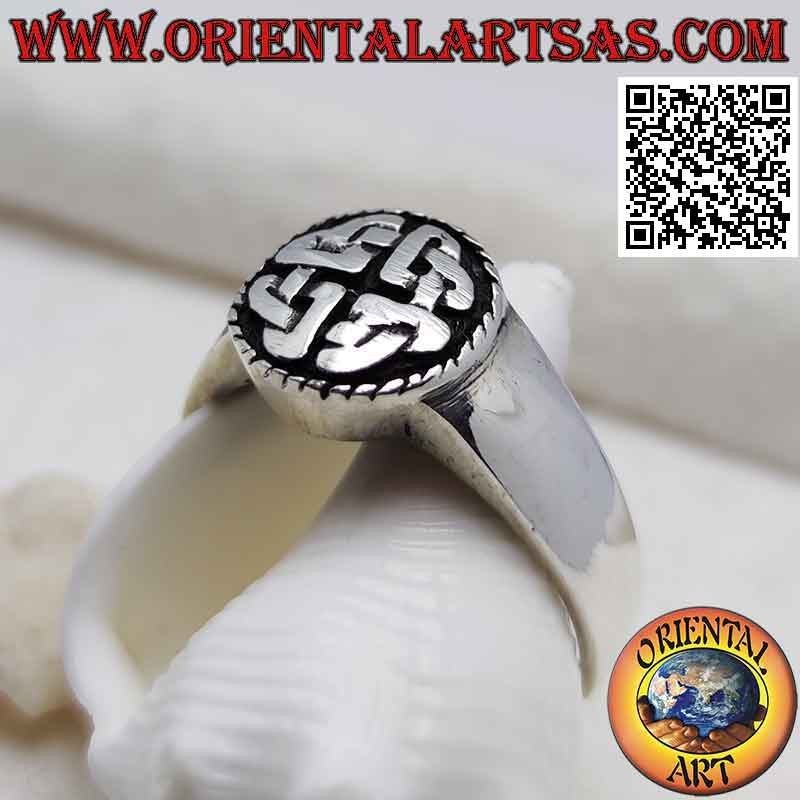 Smooth round silver ring with Duleek knot in bas relief (Celtic symbol)