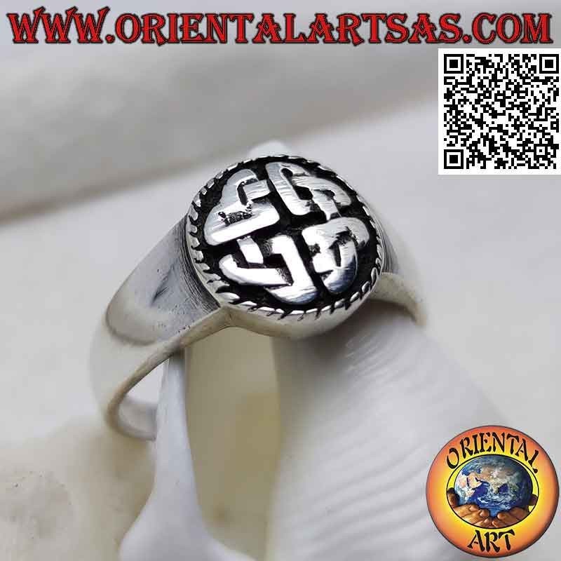 Smooth round silver ring with Duleek knot in bas relief (Celtic symbol)