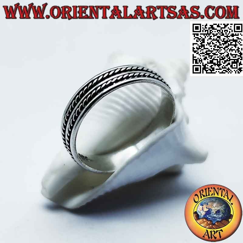 Silver ring with a smooth line between oblique interlacing