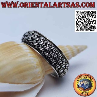 Silver ring with rounded band, intertwining of a couple of lines