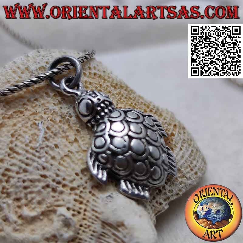 Silver pendant in the shape of an engraved and shaped sea turtle