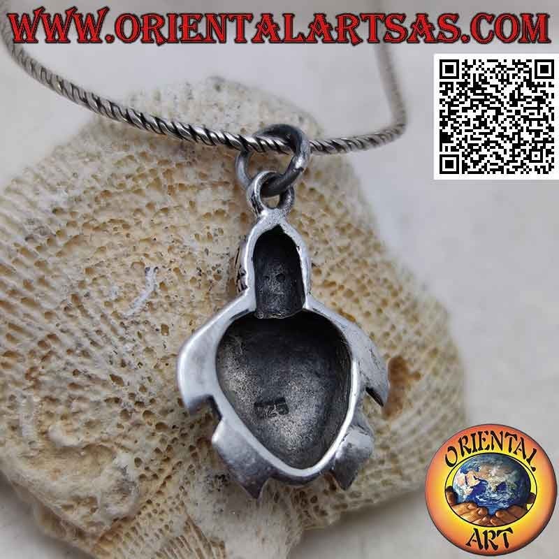 Silver pendant in the shape of an engraved and shaped sea turtle