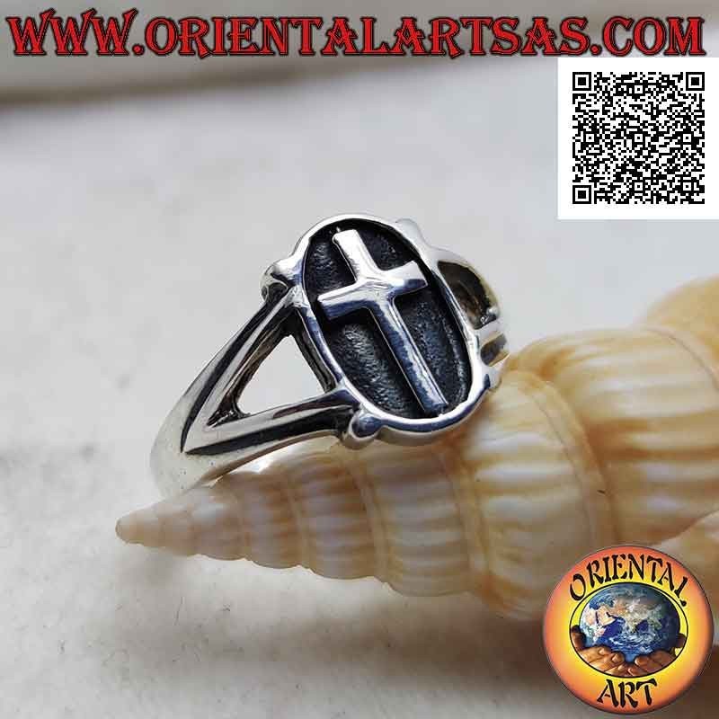 Silver ring with Latin cross in the oval in bas-relief and ball on the four corners, attached to two