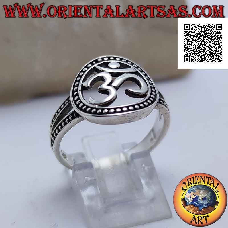 Silver ring with Sanskrit syllable "ॐ" Oṃ in the perforated dotted circle, attached by two dotted bands