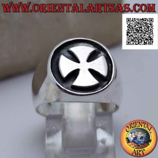 Smooth silver ring with smooth Maltese cross on a dark bas-relief background
