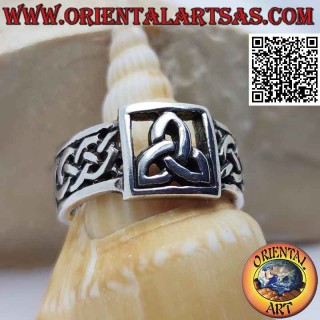 Silver ring with openwork triquetra in the square and Celtic interlacing on the sides