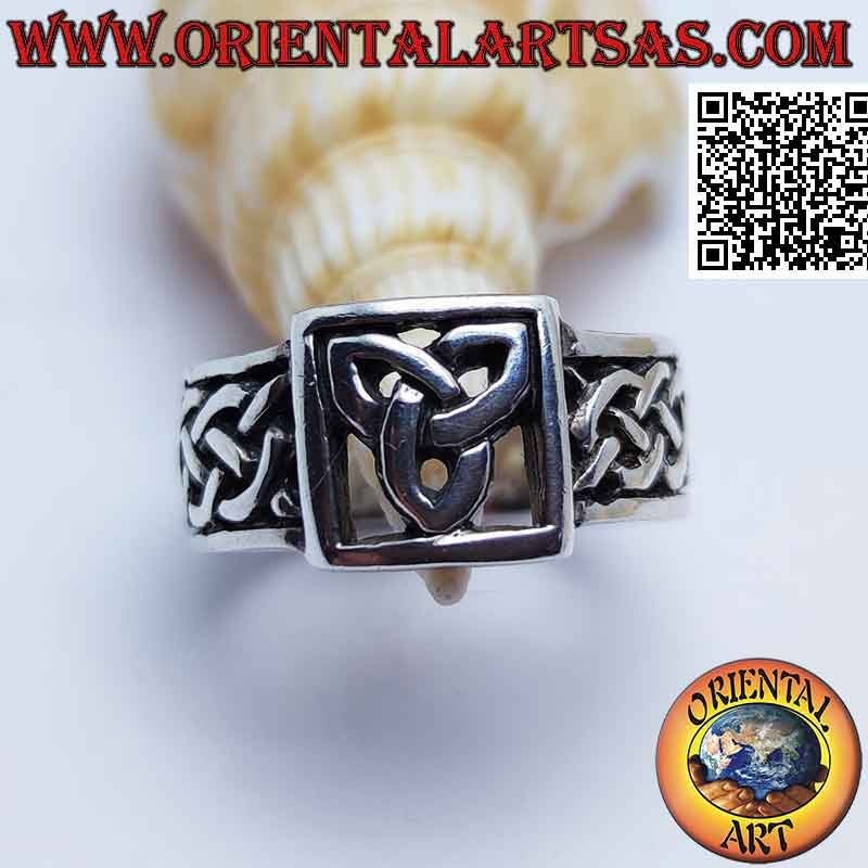 Silver ring with openwork triquetra in the square and Celtic interlacing on the sides