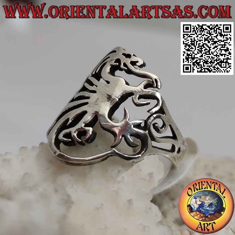 Perforated silver ring with smooth stylized griffin