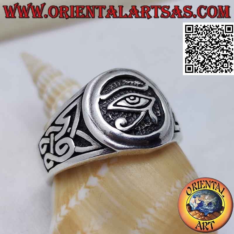 Silver ring, eye of Horus and Celtic knots on the sides in bas-relief