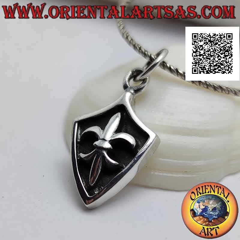 Pendentif en argent, bouclier rhomboïde avec lys en haut relief sur fond sombre