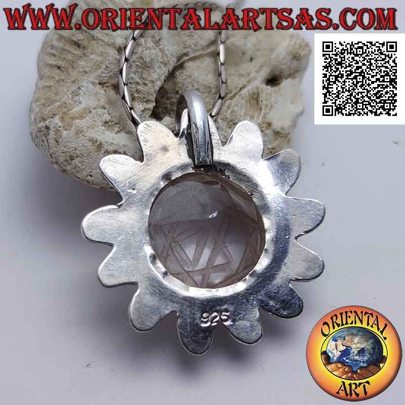 Silver pendant in the shape of a sun shaped with Sri Yantra engraved on central cabochon round rock crystal