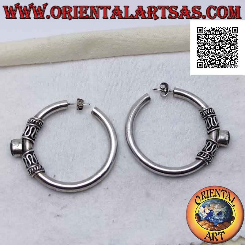 Silver hoop earrings with oval natural garnet between serpentine and lines (40 mm)