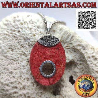 Silver pendant with red coral (coral) oval with hole and ethnic decoration