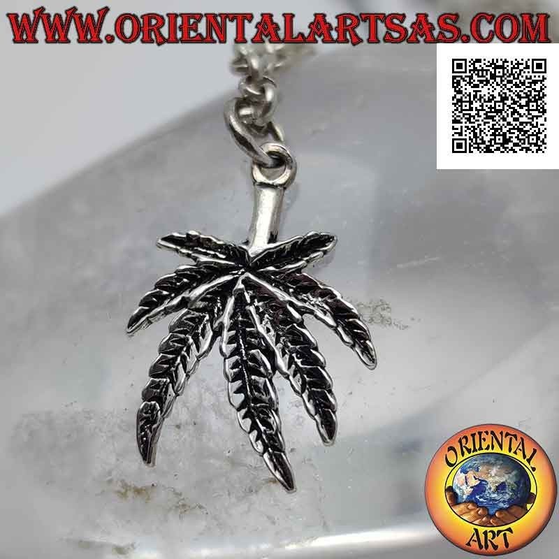 Silver pendant in the shape of a marijuana leaf engraved in low relief (thick)
