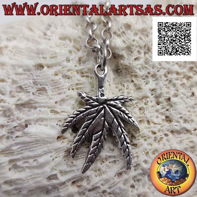 Silver pendant in the shape of a marijuana leaf engraved in low relief (thick)