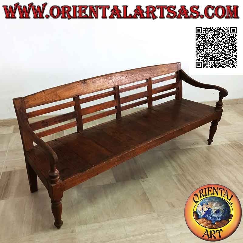 Simple four-seater bench with slatted back in antique teak wood