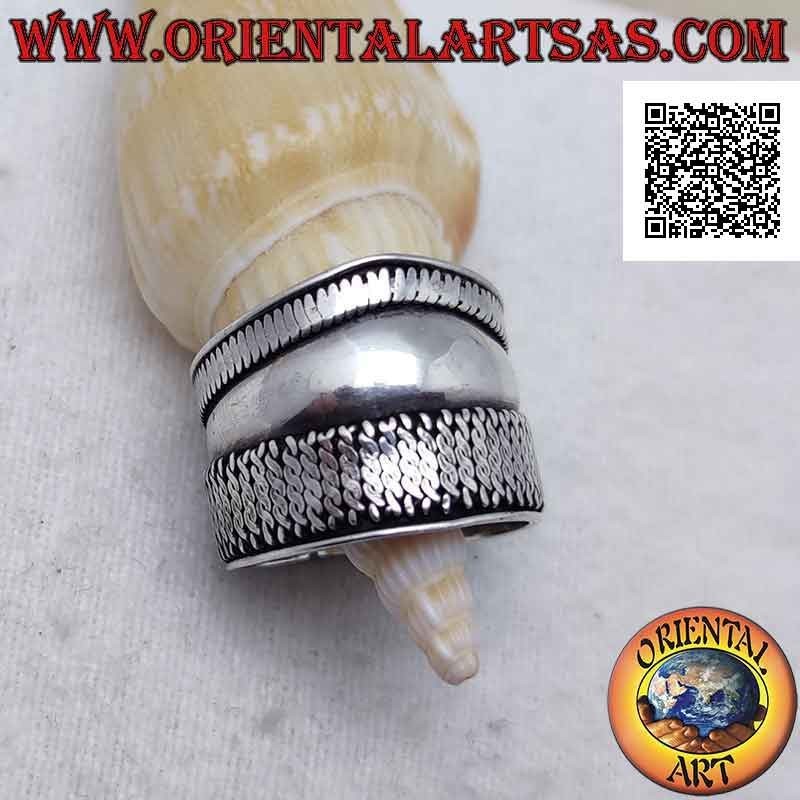 Wide band silver ring with a point and vertical interlacing on one side, Bali