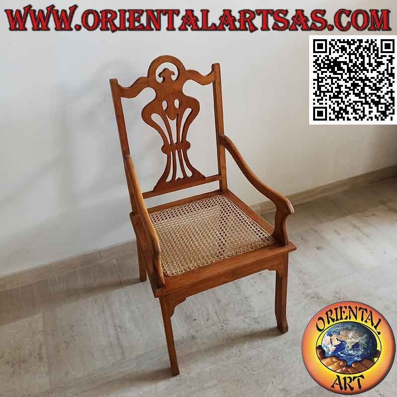 Sillón de estilo "victoriano" en madera de teca y asiento de paja de Viena