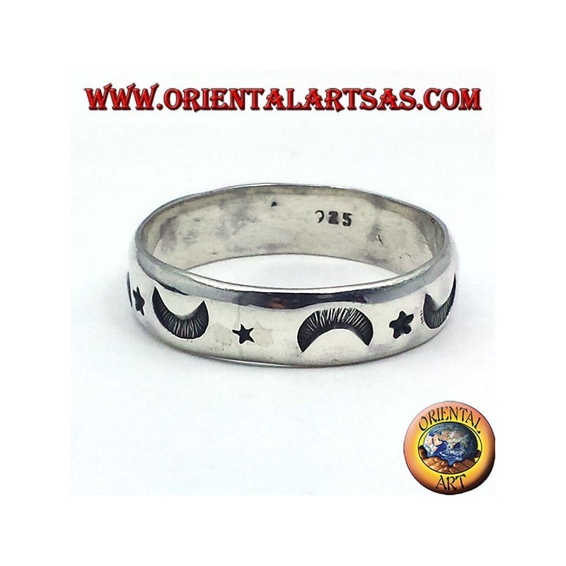 silver ring, carved star and moon