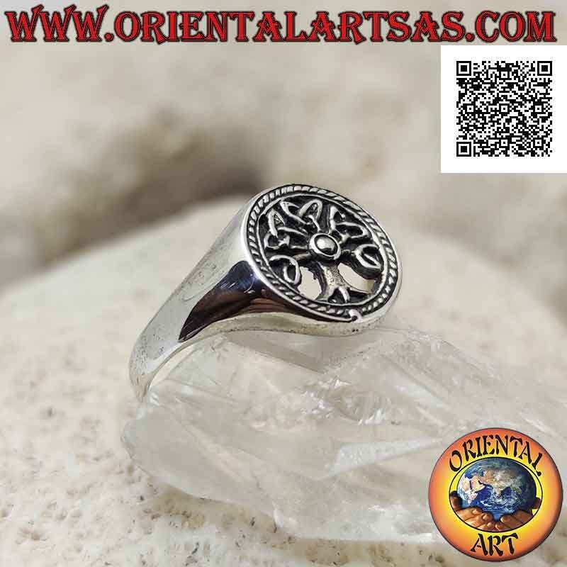Silver ring with tree of life in the openwork circle and dotted decoration
