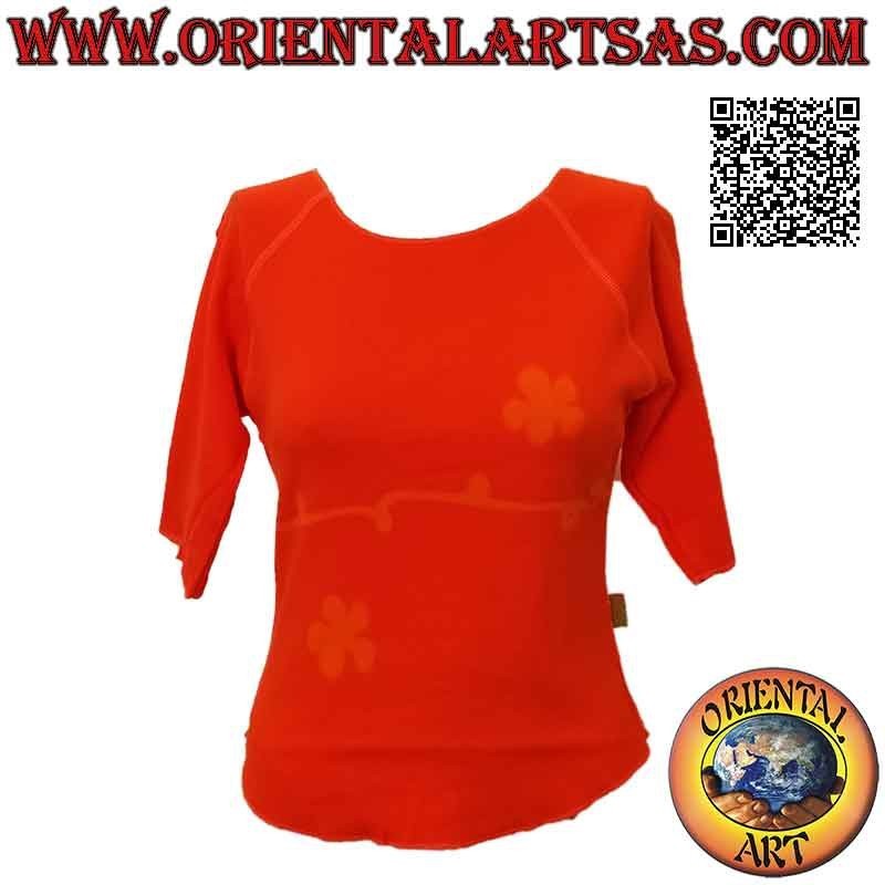 Maglia free size con collo a taglio vivo, maniche corte e fantasia (arancione)