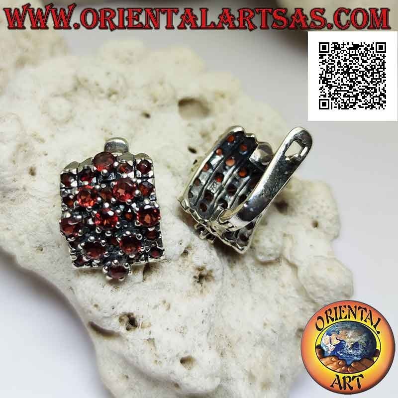 Silver earrings, curved rectangle and rhombus overlaid with small and large round garnets