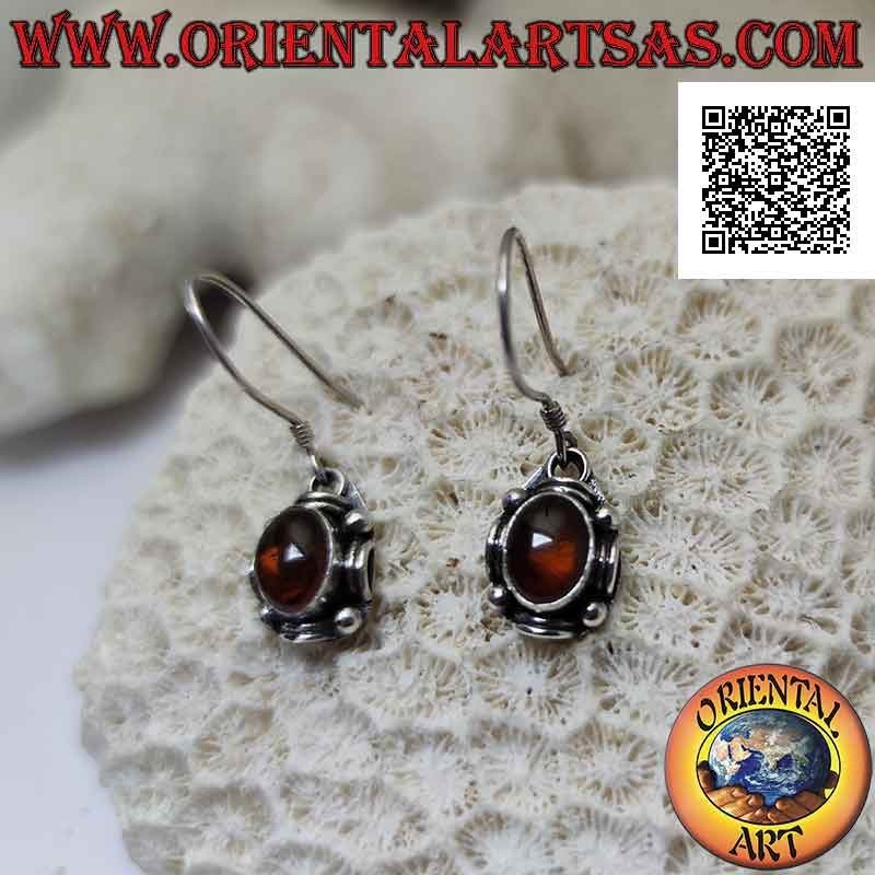 Silver pendant earrings with oval amber surrounded by alternating balls and discs