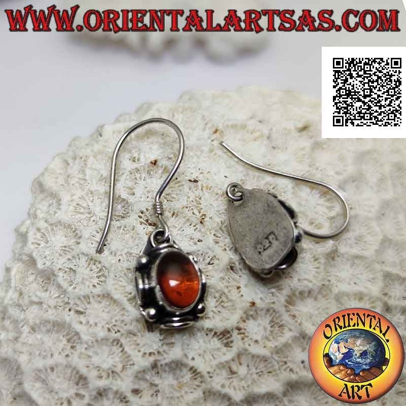 Silver pendant earrings with oval amber surrounded by alternating balls and discs