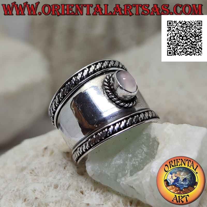 Wide band silver ring with oval rose quartz and interweaving in the contour, Bali