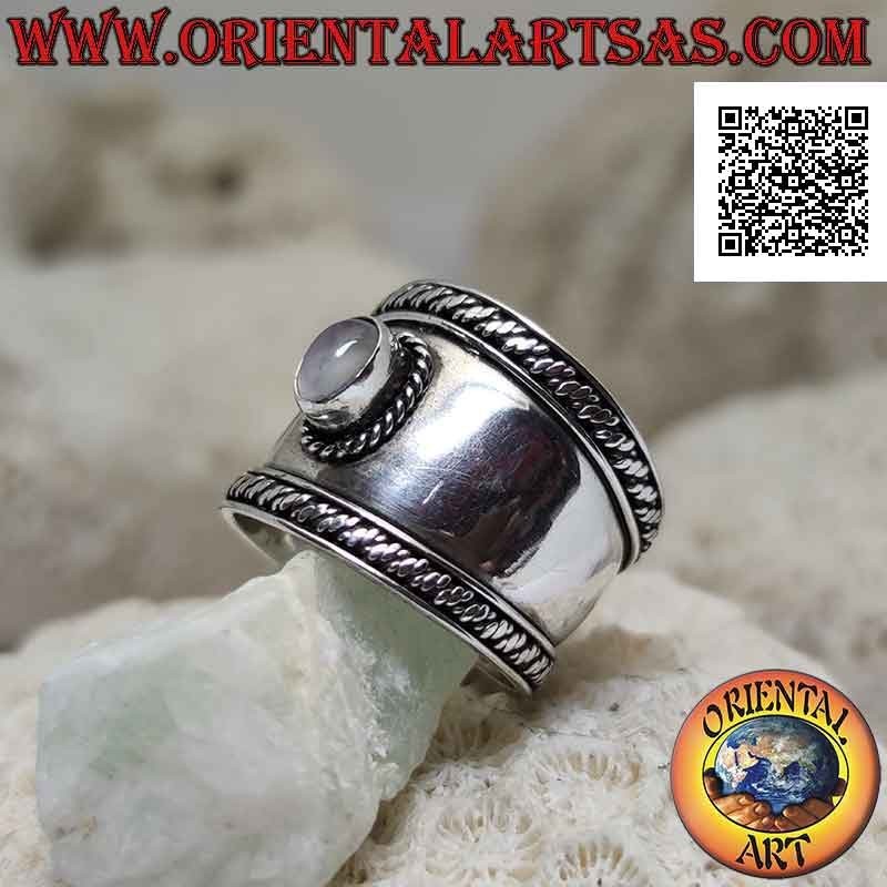Wide band silver ring with oval rose quartz and interweaving in the contour, Bali