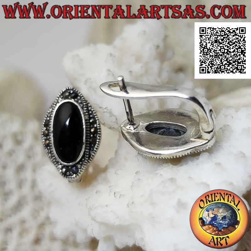 Silver earrings with oval onyx surrounded by a double intertwined ellipse studded with marcasite