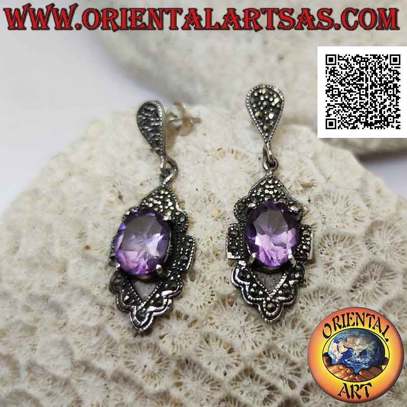 Silver earrings with faceted natural amethyst set protruding on a frame studded with marcasite
