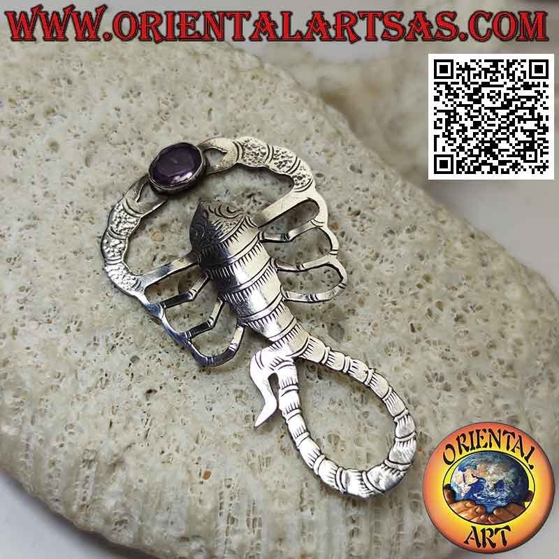 Silver brooch in the shape of a scorpion engraved with natural oval amethyst between the claws