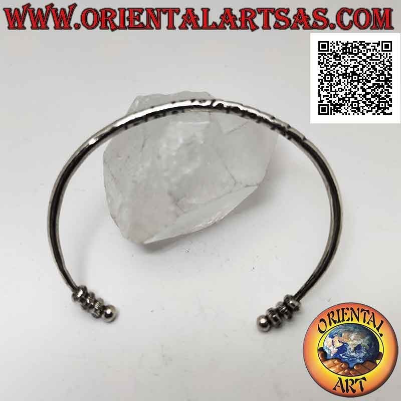 Round rigid bracelet in 925 ‰ silver with central engravings and trio of mobile donuts on the terminals