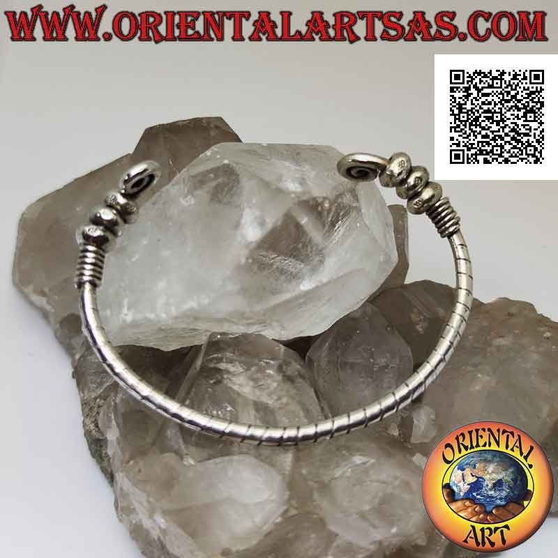 Rigid bracelet in 925 ‰ silver tubular striped with spirals on the ends and mobile donuts