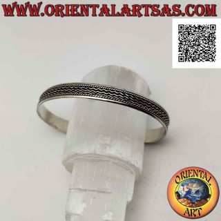 Bracciale rigido in argento 925‰ con tris di fili in bassorilievo tra intrecci