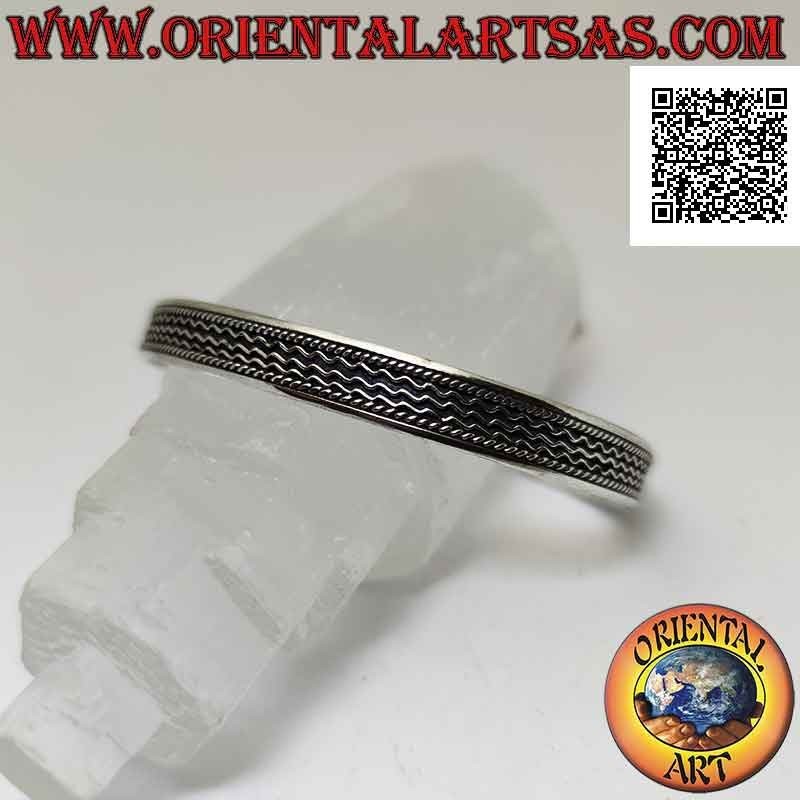Rigid bracelet in 925 ‰ silver with trio of wires in bas-relief between intertwining