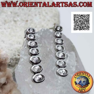 Silver earrings, row of seven smooth openwork ovals with central round white zircon