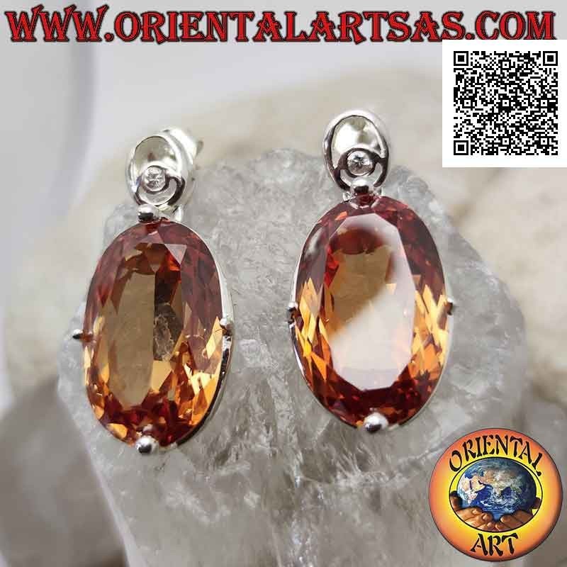 Silver lobe earrings with large faceted oval champagne zircon set in a smooth setting
