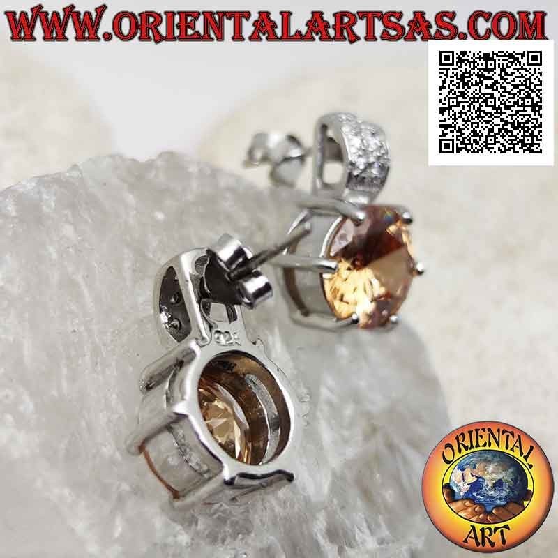 Silver lobe earrings with round faceted champagne zircon set and zircon studded band above