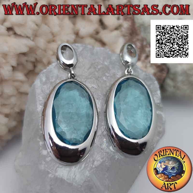 Silver lobe earrings with large faceted oval blue zircon with smooth edge wire
