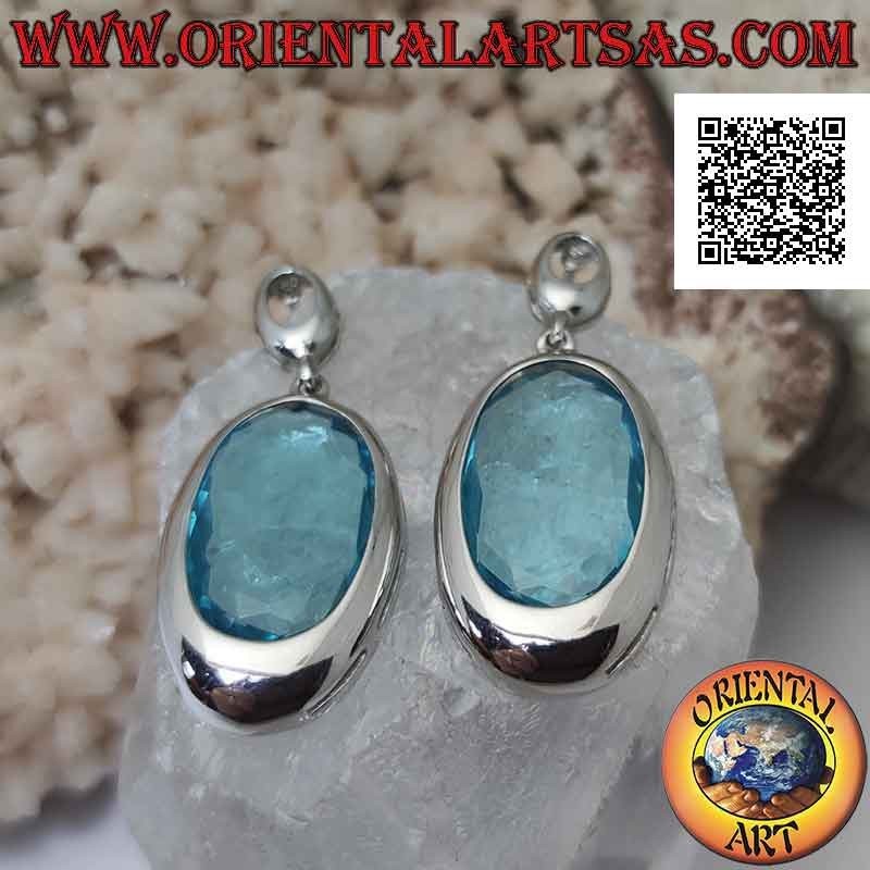 Silver lobe earrings with large faceted oval blue zircon with smooth edge wire