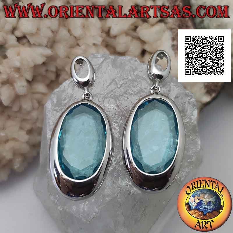 Boucles d'oreilles lobe en argent avec grand zircon bleu ovale facetté avec fil à bord lisse