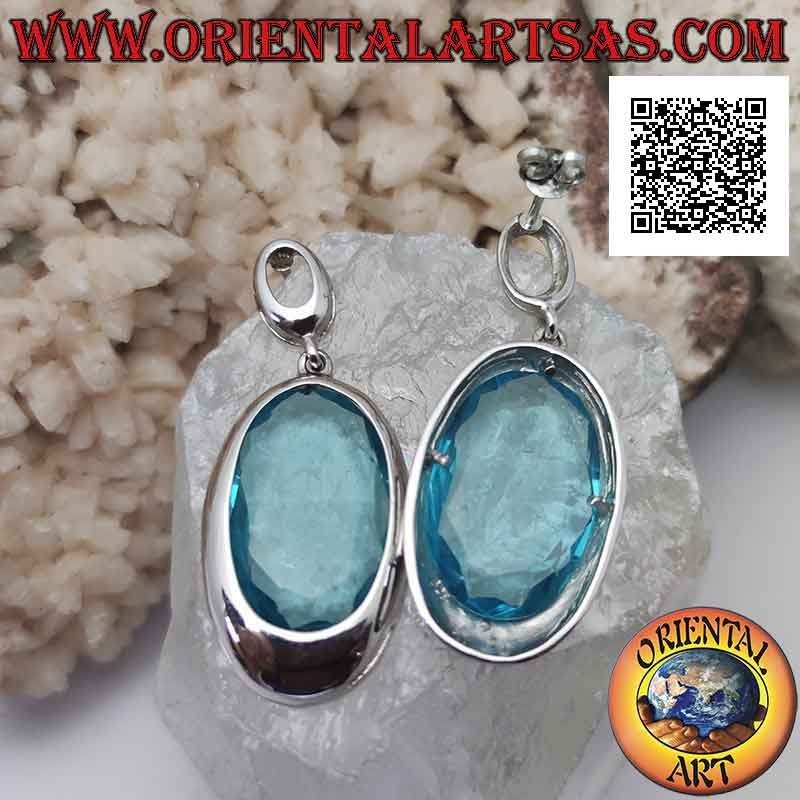 Silver lobe earrings with large faceted oval blue zircon with smooth edge wire