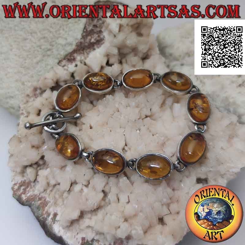 Bracelet en argent 925 ‰ avec neuf cabochons ovales en fil d'ambre à bord lisse